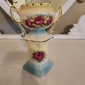 Vintage hand-painted porcelain urn/vase on pillar.